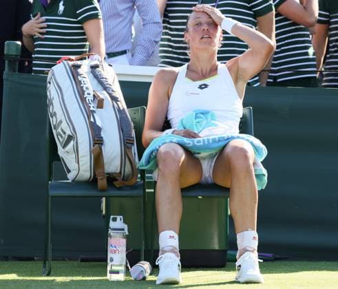 Belgian Yanina Wickmayer reacts after losing a tennis match between Belgian Wickmayer and Mexican Zarazua, in the first round of the women s singles at the 2025 Wimbledon grand slam tournament, Monday 30 June 2025 at the All England Tennis Club, in South-West London, Britain. BENOITxDOPPAGNE  x128146287x