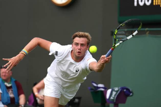 1st July 2025; All England Lawn Tennis and Croquet Club, London, England; Wimbledon Tennis Tournament, Day 2; Johannus Monday (GBR) with a forehand shot to Tommy Paul (USA)  ActionPlus12807388 JohnxPatrickxFletcher