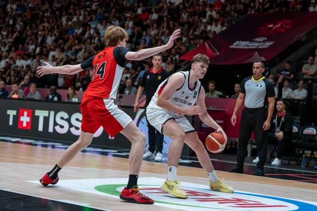 Lausanne, Switzerland, July 1st 2025: Eric Reibe (12 Germany) trying to move to the rim against Maxime Meyer (14 Canada) during the FIBA U19 Basketball World Cup 2025 group stage game between Germany and Canada at Vaudoise Arena in Lausanne, Switzerland. (Pierre-Adrien Lagrange SPP) Copyright: xPierre-AdrienxLagrangex xSPPx spp-en-PiLaSp-PAL-GER-CAN-FIBAU19-20250701-13