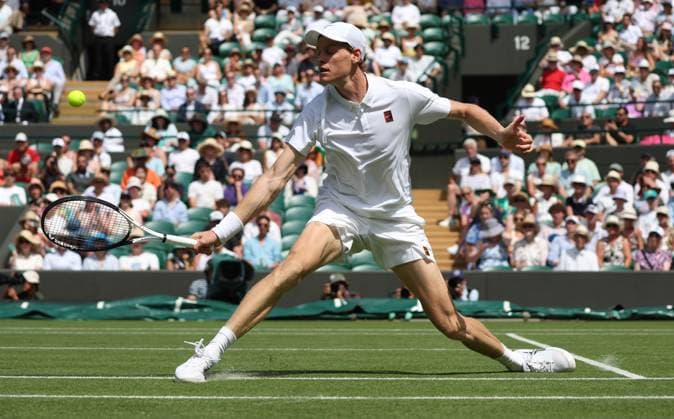 Italian Jannik Sinner plays a backhand in his match against Italian Luca Nardi on day two of the 2025 Wimbledon Championships in London on Tuesday, July 01, 2025.  LON2025070117 HUGOxPHILPOTT