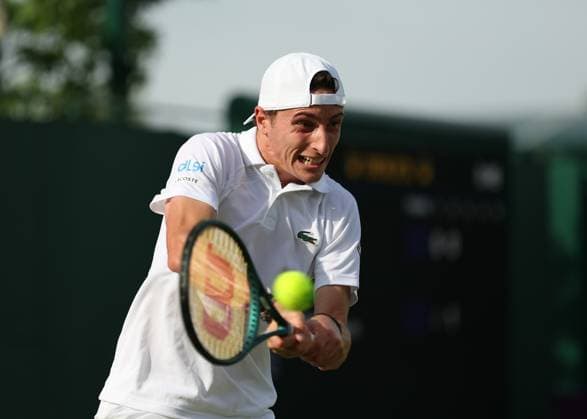 1st July 2025; All England Lawn Tennis and Croquet Club, London, England; Wimbledon Tennis Tournament, Day 2; Ugo Humbert (FRA) with a backhand shot to Gael Monfils (FRA)  ActionPlus12807581 JohnxPatrickxFletcher
