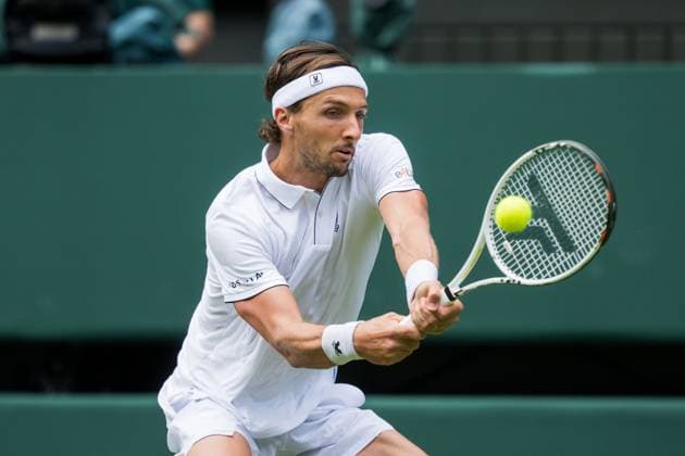 250701 Arthur Rinderknech of France competes in a first round singles tennis match during day 2 of Wimbledon on July 1, 2025 in London. Photo: Petter Arvidson BILDBYRAN kod PA PA1045 tennis wimbledon day 2 bbeng Copyright: PETTERxARVIDSON BB250701PA047