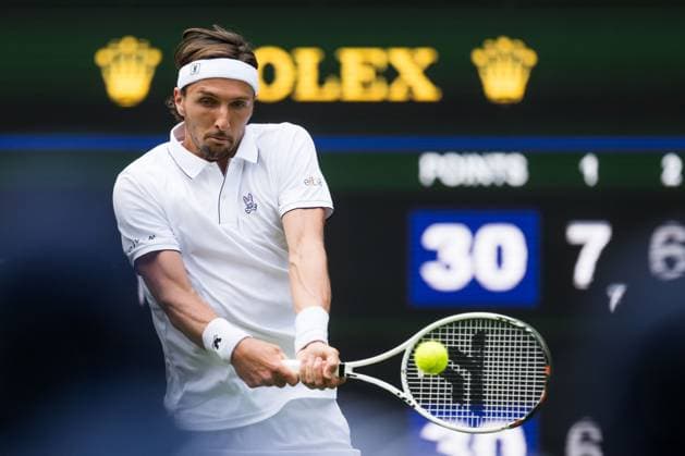 250701 Arthur Rinderknech of France competes in a first round singles tennis match during day 2 of Wimbledon on July 1, 2025 in London. Photo: Petter Arvidson BILDBYRAN kod PA PA1045 tennis wimbledon day 2 bbeng Copyright: PETTERxARVIDSON BB250701PA048