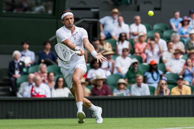 250701 Arthur Rinderknech of France competes in a first round singles tennis match during day 2 of Wimbledon on July 1, 2025 in London. Photo: Petter Arvidson BILDBYRAN kod PA PA1045 tennis wimbledon day 2 bbeng Copyright: PETTERxARVIDSON BB250701PA049