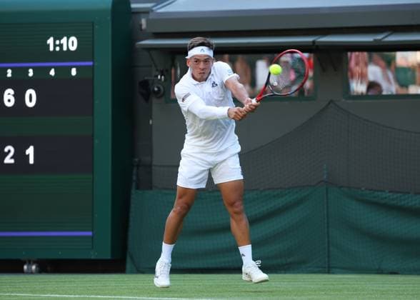 1st July 2025; All England Lawn Tennis and Croquet Club, London, England; Wimbledon Tennis Tournament, Day 2; Sebastian Baez (ARG) with a forehand shot to Jack Draper (GBR)  ActionPlus12807607 JohnxPatrickxFletcher