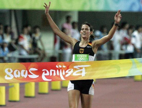 Aug 22, 2008 - Beijing, China - At the Olympic Sports Center Stadium on Friday Germany LENA SCHONEBORN crosses the finish line first to win the Gold Medal for her country in the women s Modern pentathlon, moderner Fünfkampf Copyright: xDetroitxFreexPressx
