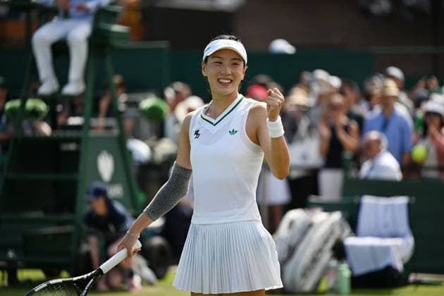 (250702) -- LONDON, July 2, 2025 -- Wang Xinyu celebrates winning the women s singles first round match between Wang Xinyu of China and Karolina Muchova of the Czech Republic at the Wimbledon Tennis Championships in London, Britain, July 1, 2025. ) (SP)BRITAIN-LONDON-TENNIS-WIMBLEDON-WOMEN S SINGLES ZhaoxDingzhe 