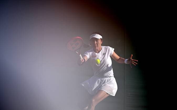 (250702) -- LONDON, July 2, 2025 -- Zhu Lin hits a return during the women s singles first round match between Zhu Lin of China and Veronika Kudermetova of Russia at the Wimbledon Tennis Championships in London, Britain, July 1, 2025. ) (SP)BRITAIN-LONDON-TENNIS-WIMBLEDON-WOMEN S SINGLES LixYing 