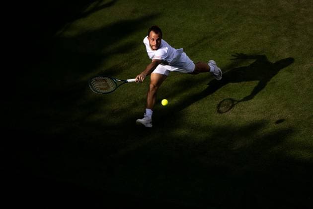 250701 Hugo Gaston of France competes in a first round singles tennis match during day 2 of Wimbledon on July 1, 2025 in London. Photo: Petter Arvidson BILDBYRAN kod PA PA1045 tennis wimbledon day 2 bbeng topx Copyright: PETTERxARVIDSON BB250701PA085