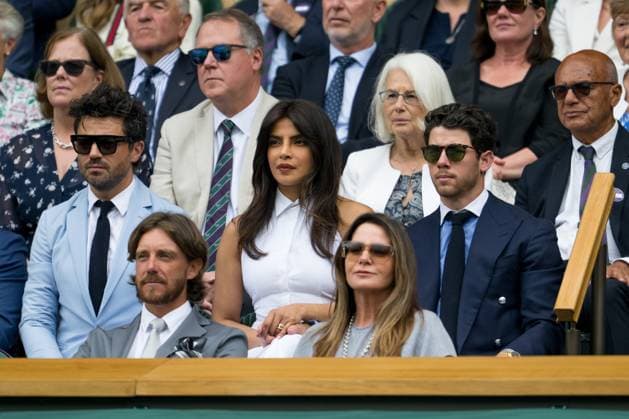 250702 Priyanka Chopra Jonas and Nick Jonas in the stands during day 3 of Wimbledon on July 2, 2025 in London . Photo: Petter Arvidson BILDBYRAN kod PA PA1047 tennis wimbledon day 3 bbeng Copyright: PETTERxARVIDSON BB250702PA007