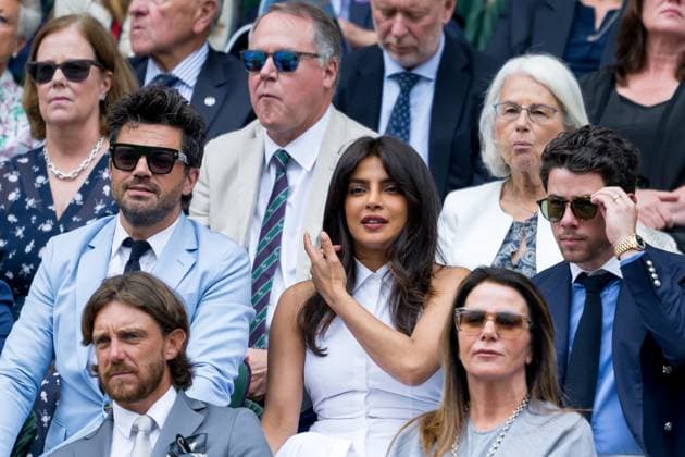 250702 Dominic Cooper, Priyanka Chopra Jonas and Nick Jonas in the stands during day 3 of Wimbledon on July 2, 2025 in London . Photo: Petter Arvidson BILDBYRAN kod PA PA1047 tennis wimbledon day 3 bbeng Copyright: PETTERxARVIDSON BB250702PA015