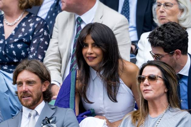 250702 Priyanka Chopra Jonas and Nick Jonas in the stands during day 3 of Wimbledon on July 2, 2025 in London . Photo: Petter Arvidson BILDBYRAN kod PA PA1047 tennis wimbledon day 3 bbeng Copyright: PETTERxARVIDSON BB250702PA016