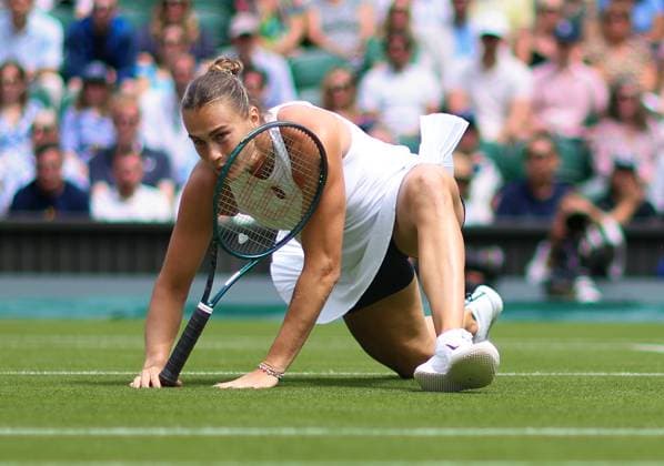 Wimbledon Championships 2025 AELTC, Day Two, London, UK - 02 07 2025 Aryna Sabalenka slips during her second round match against Marie Bouzkova (CZE) in the 2025 Wimbledon Championships London Wimbledon London GBR, UK NEWSPAPERS OUT Copyright: xMarkxGreenwoodx