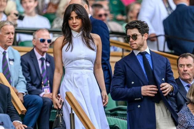 250702 Priyanka Chopra Jonas and Nick Jonas in the stands during day 3 of Wimbledon on July 2, 2025 in London. Photo: Petter Arvidson BILDBYRAN kod PA PA1047 tennis wimbledon day 3 bbeng Copyright: PETTERxARVIDSON BB250702PA057