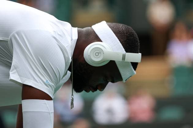 2nd July 2025; All England Lawn Tennis and Croquet Club, London, England; Wimbledon Tennis Tournament, Day 3; Frances Tiafoe (FRA) wearing Bose headphones before playing his match against Cameron Norrie (GBR) on Court Number One  ActionPlus12807846 JohnxPatrickxFletcher