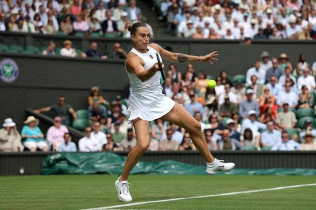 2nd July 2025; All England Lawn Tennis and Croquet Club, London, England; Wimbledon Tennis Tournament, Day 3; Aryna Sabalenka (BEL) with a forehand shot to Marie Bouzkova (CZE)  ActionPlus12807895 JohnxPatrickxFletcher