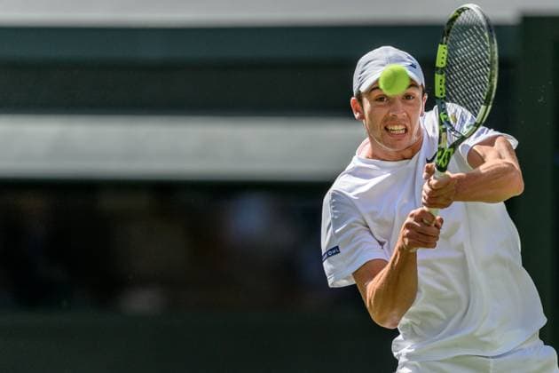 250702 Oliver Tarvet of Great Britain competes in a second round singles tennis match during day 3 of Wimbledon on July 2, 2025 in London . Photo: Petter Arvidson BILDBYRAN kod PA PA1047 tennis wimbledon day 3 bbeng Copyright: PETTERxARVIDSON BB250702PA073