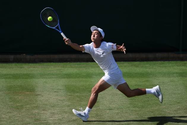 July 2, 2025, London, Celestynow, England: SHINTARO MOCHIZUKI of Japan during the match against K. Khachanov in the second round of Championships 2025 at Wimbledon AELTC in London. London England - ZUMAc278 20250702_zsp_c278_086 Copyright: xMarcinxCholewinskix