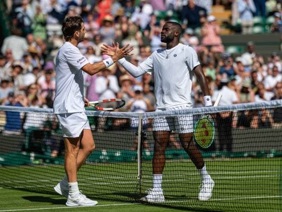 Tennis - Wimbledon Championship 2025 - Day 3 LONDON, ENGLAND - Wednesday, July 2, 2025: Cameron Norrie (GBR) (L) shakes hands with Frances Tiafoe (USA) after the Gentlemen s Singles 2nd Round on Day Three of The Championships Wimbledon 2025 at the All England Lawn Tennis and Croquet Club. Norrie won 4-6 6-4 6-3 7-5. (Photo by Kirsten Holst Propaganda) LONDON All England Lawn Tennis and Croquet Club GREATER LONDON ENGLAND  Copyright: xKirstenxHolstx 2025-07-02-030-Wimbledon_Day_3