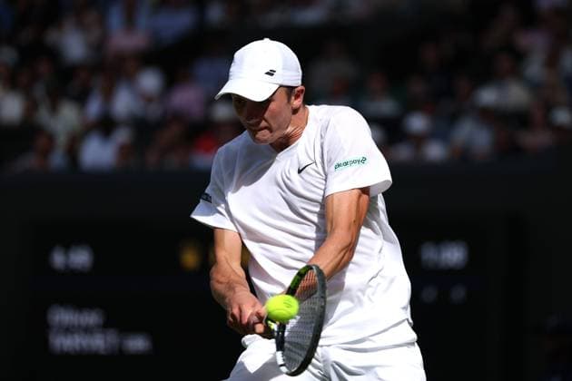 2nd July 2025; All England Lawn Tennis and Croquet Club, London, England; Wimbledon Tennis Tournament, Day 3; Oliver Tarvet (GBR) with a backhand shot to Carlos Alcaraz (ESP)  ActionPlus12807995 JohnxPatrickxFletcher