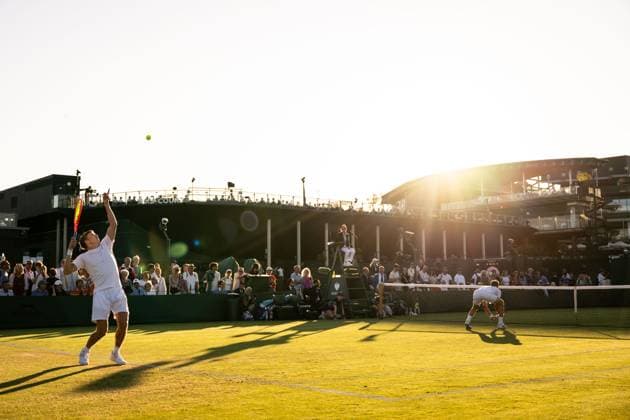 250702 AndrÃ Göransson of Sweden competes in a second round doubles tennis match during day 3 of Wimbledon on July 2, 2025 in London . Photo: Petter Arvidson BILDBYRAN kod PA PA1047 tennis wimbledon day 3 bbeng sverige Copyright: PETTERxARVIDSON BB250702PA097
