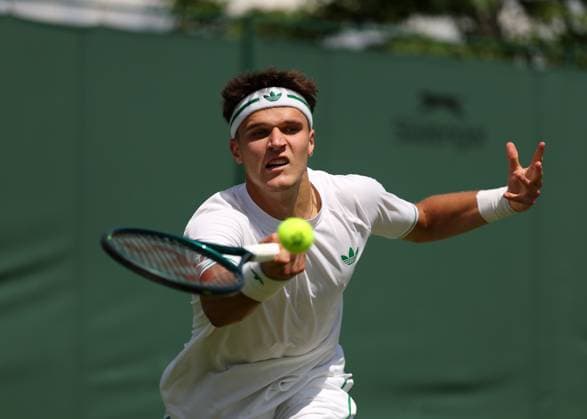 3rd July 2025; All England Lawn Tennis and Croquet Club, London, England; Wimbledon Tennis Tournament, Day 4; Jakub Mensik (CZE) with a forehand shot to Marcos Giron (USA)  ActionPlus12808099 JohnxPatrickxFletcher