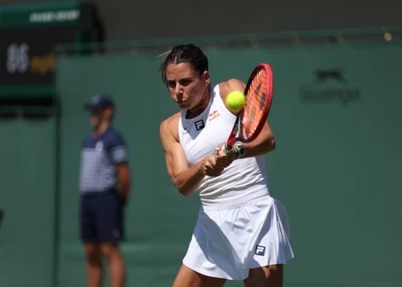 3rd July 2025; All England Lawn Tennis and Croquet Club, London, England; Wimbledon Tennis Tournament, Day 4; Emma Navarro (USA) with a backhand shot to Veronika Kudermetova (RUS)  ActionPlus12808142 JohnxPatrickxFletcher