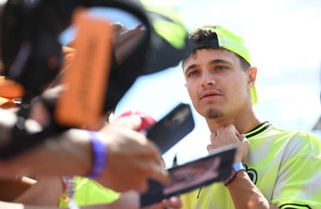 3rd July 2025; Silverstone Circuit, Northamptonshire, England; Formula 1 2025 Qatar Airways British F1 Grand Prix; Arrivals and Inspection Day; Lando Norris of McLaren signs autographs on arrival at Silverstone  ActionPlus12808254 SimonxWest