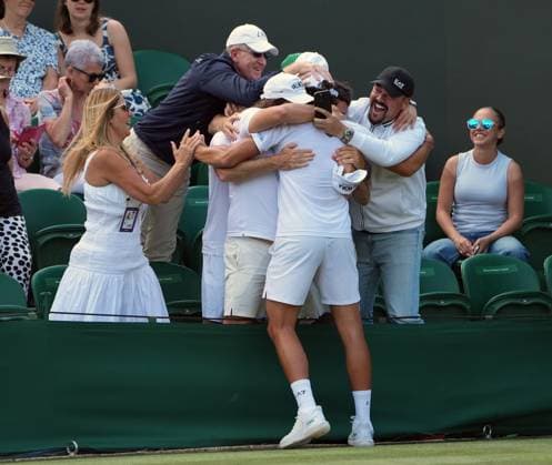 Tennis - 2025 Wimbledon Championships - Men™s Singles - 2nd round - Arthur Fery v Luciano Dardei All England Lawn Tennis & Croquet Club - Thursday 3rd July 2025 Luciano Dardei of Italy celebrates with his coaches after winning the match 