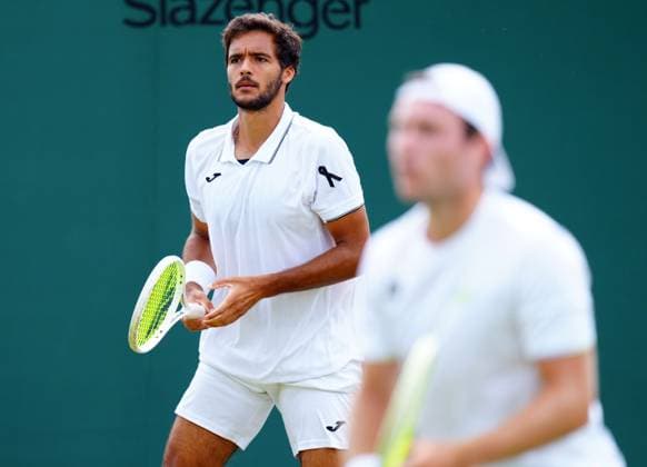 Francisco Cabral of Portugal wearing a black ribbon for Diogo Jota, during his Men s Doubles second round match Wimbledon Tennis Championships, Day 5, The All England Lawn Tennis and Croquet Club, London, UK - 04 Jul 2025London The All England Lawn Tennis and United Kingdom  Copyright: xJavierxGarcia Shutterstockx 15384469h