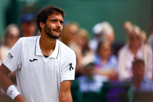 Francisco Cabral of Portugal wearing a black ribbon for Diogo Jota, during his Men s Doubles second round match Wimbledon Tennis Championships, Day 5, The All England Lawn Tennis and Croquet Club, London, UK - 04 Jul 2025London The All England Lawn Tennis and United Kingdom  Copyright: xJamesxMarsh Shutterstockx 15384470a