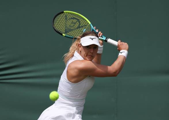 4th July 2025; All England Lawn Tennis and Croquet Club, London, England; Wimbledon Tennis Tournament, Day 5; Amanda Anisimova (USA) with a backhand shot to Dalma Galfi (HUN)  ActionPlus12808752 JohnxPatrickxFletcher