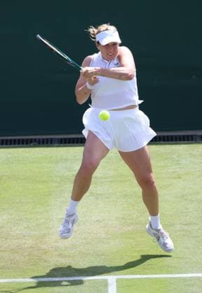 Anastasia Pavlyuchenkova plays a backhand in her third round match against Japan s Naomi Osaka on day five of the 2025 Wimbledon Championships in London on Friday, June 04, 2025.  LON2025070417 HUGOxPHILPOTT