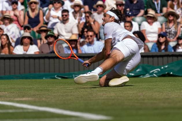 2025-07-04 Wimbledon 2025 LONDON, ENGLAND - JULY 4: Taylor Fritz of The USA, falling on court during Wimbledon 2025 at All England Lawn Tennis & Croquet Club on July 4, 2025 in London, England. London All England Lawn Tennis & Croquet Club England Content not available for redistribution in The Netherlands directly or indirectly through any third parties. Copyright: xMarleenxFouchierx