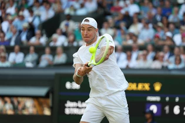 4th July 2025; All England Lawn Tennis and Croquet Club, London, England; Wimbledon Tennis Tournament, Day 5; Jan-Lennard Struff (GER) with a backhand shot to Carlos Alcaraz (ESP)  ActionPlus12809193 JohnxPatrickxFletcher