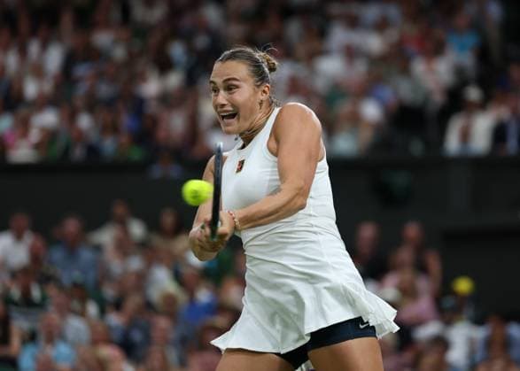 4th July 2025; All England Lawn Tennis and Croquet Club, London, England; Wimbledon Tennis Tournament, Day 5; Aryna Sabalenka (BLR) with a backhand shot to Emma Raducanu (GBR)  ActionPlus12809209 JohnxPatrickxFletcher