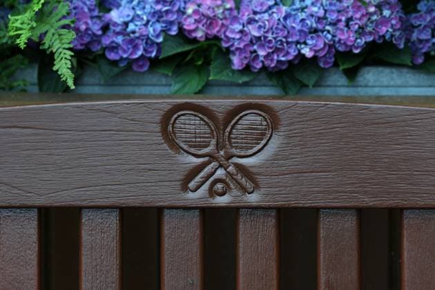 5th July 2025; All England Lawn Tennis and Croquet Club, London, England; Wimbledon Tennis Tournament, Day 6; Wimbledon logo carved on wooden garden chair outside Centre Court  ActionPlus12809266 JohnxPatrickxFletcher