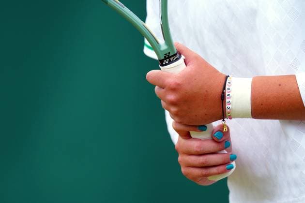 The bracelet of Clara Tauson during her third round match Wimbledon Tennis Championships, Day 6, The All England Lawn Tennis and Croquet Club, London, UK - 05 Jul 2025London The All England Lawn Tennis and United Kingdom  Copyright: xJavierxGarcia Shutterstockx 15385616o