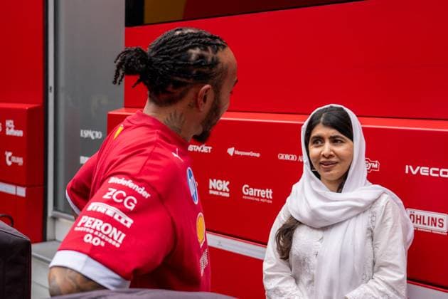 F1 British GP 2025 - UK Lewis Hamilton (Gbr) of Scuderia Ferrari 44 and Activist Malala Yousafzai (Pak) during the Formula 1 Qatar Airways British Grand Prix 2025 on Saturday at the Silverstone International Circuit, Silverstone, Great Britain on July 5, 2025 Photo by Photo by Antoine Lapeyre ABACAPRESS.COM Silverstone United Kingdom  Copyright: xLapeyrexAntoine ABACAx