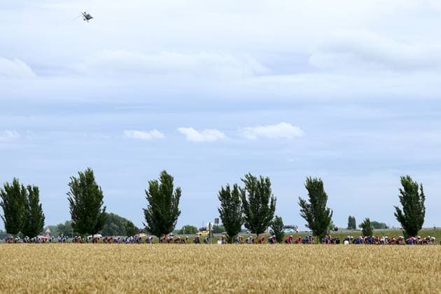 The pack of riders pictured in action during the first stage, Lille Metropole to Lille Metropole (185 km), of the 2025 Tour de France cycling race, in Lille, France, on Saturday 05 July 2025. The 112th edition of the Tour de France starts on Saturday 5 July in Lille, France, and will finish in Paris, France on the 27th of July. DAVIDxPINTENS  x128486796x