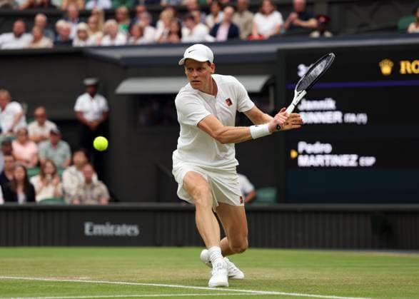 5th July 2025; All England Lawn Tennis and Croquet Club, London, England; Wimbledon Tennis Tournament, Day 6; Jannik Sinner (ITA) with a backhand shot to Pedro Martinez (ESP)  ActionPlus12809691 JohnxPatrickxFletcher
