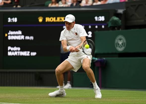 5th July 2025; All England Lawn Tennis and Croquet Club, London, England; Wimbledon Tennis Tournament, Day 6; Jannik Sinner (ITA) with a backhand shot to Pedro Martinez (ESP)  ActionPlus12809693 JohnxPatrickxFletcher