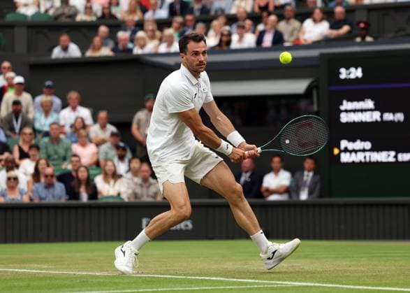 5th July 2025; All England Lawn Tennis and Croquet Club, London, England; Wimbledon Tennis Tournament, Day 6; Pedro Martinez (ESP) with a backhand shot to Jannik Sinner (ITA)  ActionPlus12809697 JohnxPatrickxFletcher