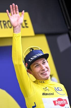 Belgian Jasper Philipsen of Alpecin-Deceuninck celebrates in the yellow jersey of leader in the overall ranking after the first stage, Lille Metropole to Lille Metropole (185 km), of the 2025 Tour de France cycling race, in Lille, France, on Saturday 05 July 2025. The 112th edition of the Tour de France starts on Saturday 5 July in Lille, France, and will finish in Paris, France on the 27th of July. JASPERxJACOBS  x128489954x