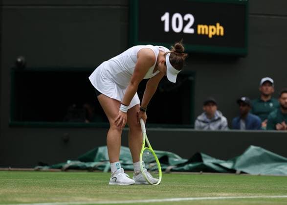 5th July 2025; All England Lawn Tennis and Croquet Club, London, England; Wimbledon Tennis Tournament, Day 6; Barbora Krejcikova (CZE) trying to get through physical pain during her match against Emma Navarro (USA)  ActionPlus12809921 JohnxPatrickxFletcher