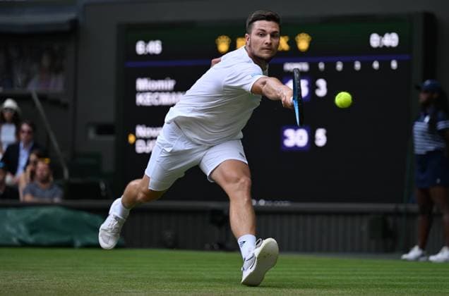 Day Six: The Championships - Wimbledon 2025 LONDON, ENGLAND - JULY 05: Miomir Kecmanovic of Serbia in action against Novak Djokovic of Serbia during the Gentlemen s Singles third round match on day six of The Championships Wimbledon 2025 at All England Lawn Tennis and Croquet Club on July 05, 2025 in London, England. London All England Lawn Tennis and Croq England United Kingdom Copyright: xVisionhausx 776301258