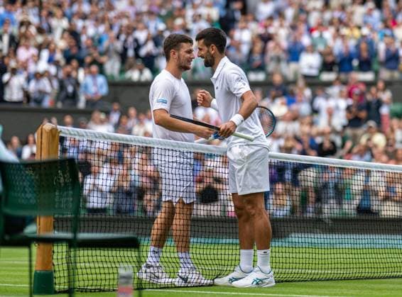 Tennis - Wimbledon Championship 2025 - Day 6 LONDON, ENGLAND - Saturday, July 5, 2025: Novak Djokovic (SRB) (R) shakes hands with Miomir Kecmanovic (SRB) after winning the Gentlemen s Singles 3rd Round on Day Six of The Championships Wimbledon 2025 at the All England Lawn Tennis and Croquet Club. Djokovic won 6-3, 6-0, 6-4. (Photo by Kirsten Holst Propaganda) LONDON All England Lawn Tennis and Croquet Club GREATER LONDON ENGLAND  Copyright: xKirstenxHolstx 2025-07-05-104-Wimbledon_2025_Day_6