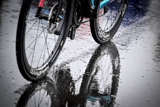 A lot of rain pictured at the start of the second stage of the 2025 Tour de France cycling race, from Lauwin-Planque to Boulogne-sur-Mer (212 km), on Sunday 06 July 2025 in France. The 112th edition of the Tour de France starts on Saturday 5 July in Lille, and will finish in Paris on the 27th of July. JASPERxJACOBS  x128531180x