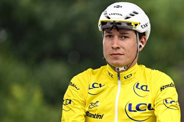 Belgian Jasper Philipsen of Alpecin-Deceuninck wearing the yellow jersey pictured at the start of the second stage of the 2025 Tour de France cycling race, from Lauwin-Planque to Boulogne-sur-Mer (212 km), on Sunday 06 July 2025 in France. The 112th edition of the Tour de France starts on Saturday 5 July in Lille, and will finish in Paris on the 27th of July. DAVIDxPINTENS  x128534056x