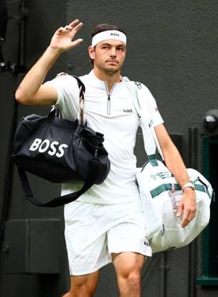 Taylor Fritz walking onto court ahead of his fourth round match Wimbledon Tennis Championships, Day 7, The All England Lawn Tennis and Croquet Club, London, UK - 06 Jul 2025London The All England Lawn Tennis and United Kingdom  Copyright: xJamesxMarsh Shutterstockx 15387062f
